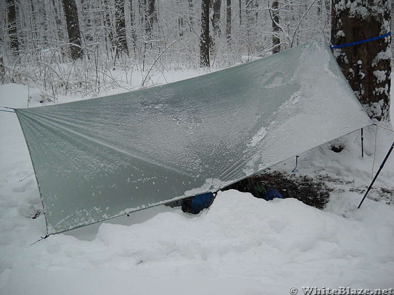 Raising tarp front to allow more space to pack up