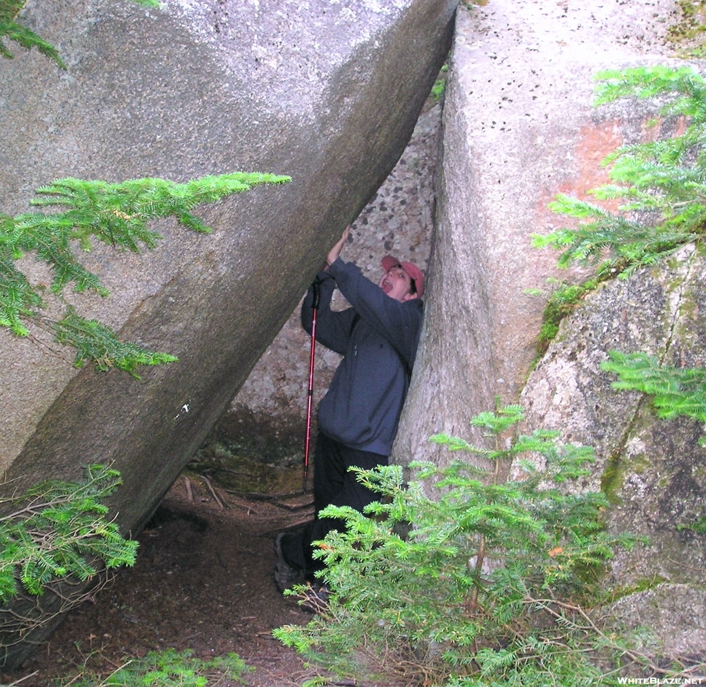 Flash holds up a falling boulder on Katahdin