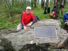 Rainman by the map plaque on Springer Mountain by Rainman in Springer Mtn Gallery