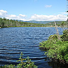Ethan Pond by muddy boots in Ethan Pond Campsite and Shelter