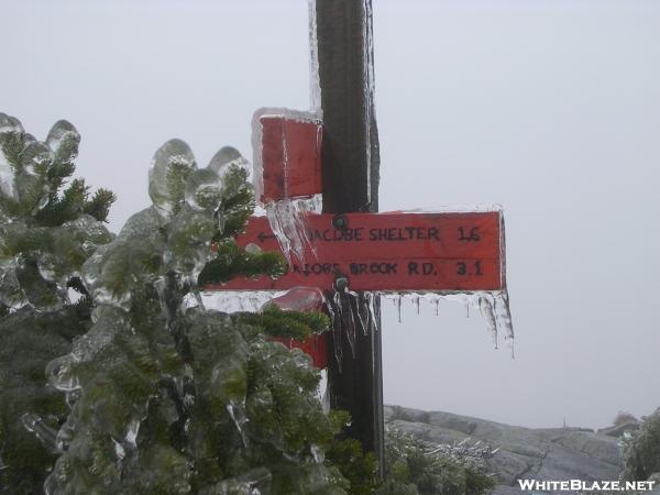 Ice hangs on sign atop Mt. Cube
