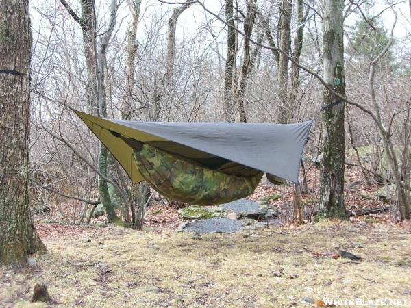 Hammock and underquilt next to stream