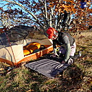 Hoppin John Rolling Up His Exped Downmat by Tipi Walter in Tent camping