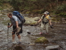 Eman And Cuffs Crossing The Slickrock