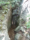 tight squeeze near Morgan Stewart shelter, @ mile 1416 by EarlyBird2007 in Trail & Blazes in New Jersey & New York