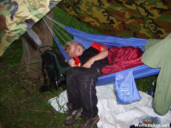 Exhausted Son Hangin Out In Dad's Hammock