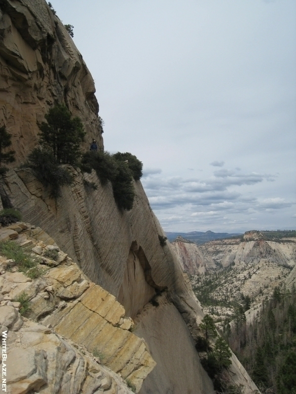 Chris on ledge of West Rim Trail at Zion